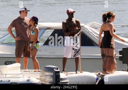 Matt Damon with wife and daughter and fellow Ocean's Eleven actor Don Cheadle on holiday as guests at George Clooney's villa in Laglio, Lake Como, Italy. Stock Photo