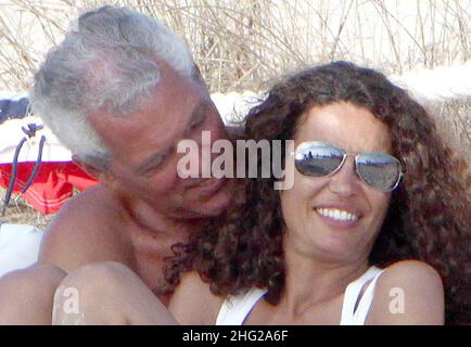 Businessman Marco Tronchetti Provera and his wife Afef Jnifen meet friends at the beach, Spain Stock Photo