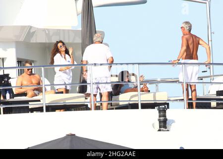 Naomi Campbell, boyfriend Vladimir Doronin, British Billionaire Phillip Green who owns Top Shop among many other retail outlets, Marco Tronchetti Provera and Afef Jnifen on a yacht in Formentera, Spain Stock Photo