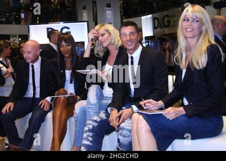 The Designer Domenico Dolce and Stefano Gabbana with the top models Naomi Campbell, Eva Herzigova and Claudia Schiffer pose at the launch of the new D&G fragrance 'Anthology Fragrance' at the Rinascente Store in Milan  Stock Photo