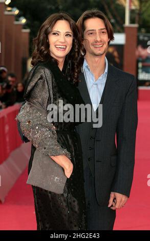 Asia Argento and husband Michele Civetta attend the screening of 'Dream rush'  during the 4th Rome Film Festival in Rome, Italy.   Stock Photo