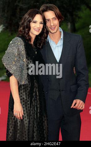 Asia Argento and husband Michele Civetta attend the screening of 'Dream rush'  during the 4th Rome Film Festival in Rome, Italy.   Stock Photo
