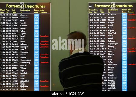 European airports are still at a stand still caused by Icelandic volcano Eyjafjollajokull. Passengers waiting in Rome Fiumicino airport, Rome Stock Photo