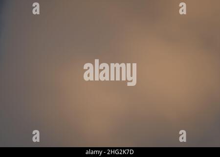 Background Texture. Hazy Clouds Reflections in Warm Light. Stock Photo