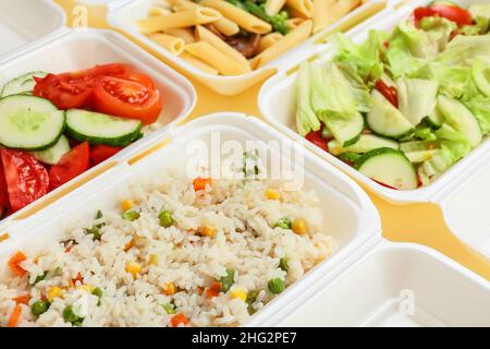 Containers with different tasty food, closeup Stock Photo