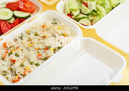 Containers with different tasty food, closeup Stock Photo