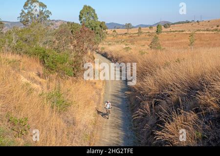 Cycling near Harlin on the Brisbane Valley Rail Trail Stock Photo