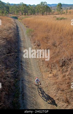 Cycling near Harlin on the Brisbane Valley Rail Trail Stock Photo