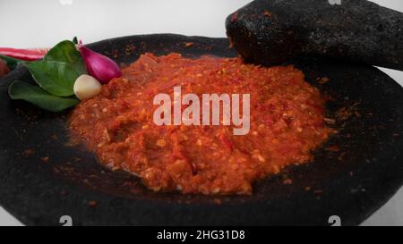 Fresh Red Hot Chili Paste on a Mortar Stock Photo