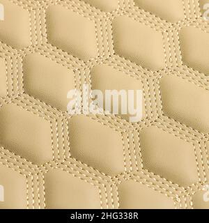 Texture of beige leather background with square pattern and stitch, macro Stock Photo