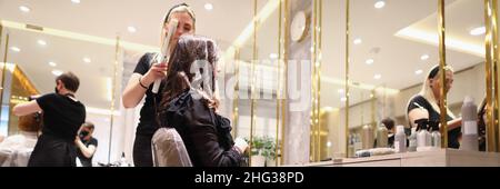 Pretty client with long hair Stock Photo