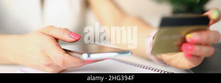 Lady doing outpayment Stock Photo