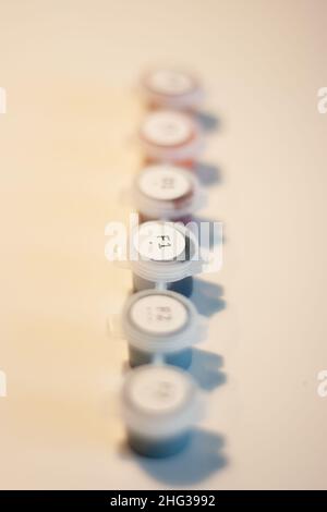 Plastic containers with watercolors close - up. Stock Photo