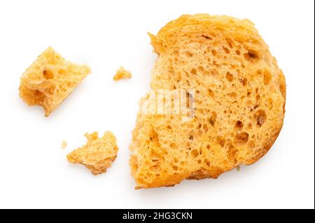 Olive and tomato bruschetta chip isolated on white. Broken with crumbs. Top view. Stock Photo