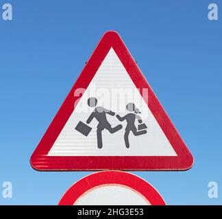 Traffic sign warning for playing children or crossing school children, Lanzarote (Spain) Stock Photo