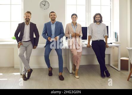 Portrait of smiling successful diverse businesspeople in office Stock Photo