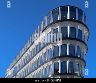 30 Cannon Street, London, UK. The first building in the world to be clad with glass reinforced concrete panels. St Pauls Cathedral in the background. Stock Photo