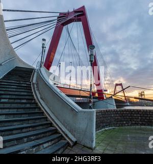 Stairs to the pedestrian area of the Willemsbrug ( Willems bridge) that connects the north part of Rotterdam with the Noordereiland Stock Photo