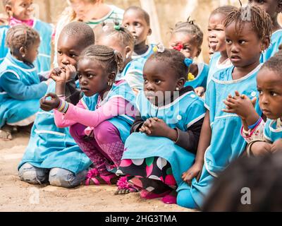 Senegal, Africa - January 2019: African children in uniform in  the African school during their break from the lesson. Stock Photo