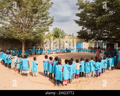 Senegal, Africa - January 2019: African children in uniform in  the African school during their break from the lesson. Stock Photo