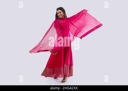 Beautiful Indian woman in salwar posing in front of camera Stock Photo