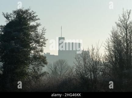 Windsor, Berkshire, UK. 18th January, 2022. Fog shrouds Windsor Castle. It was a cold morning today in Windsor as temperatures were -2 degrees. There was a heavy overnight frost and fog. Credit: Maureen McLean/Alamy Live News Stock Photo