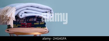 Stack of woolen checked blankets Stock Photo