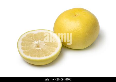 Whole and halved Sweetie citrus fruit close up isolated on white background Stock Photo