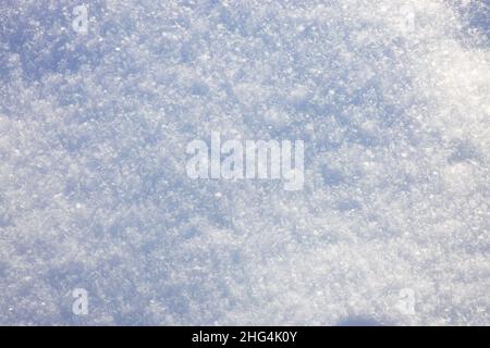 Close up macro shot of beautiful stunning glowing snow and snowflakes. Snow design abstract pattern. High quality photo Stock Photo