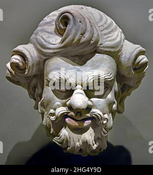 Head of a bearded man (Silenus or Atlas)  2nd century AD - 3rd century AD Pakistan style  Haḍḍa 30 x 30 x 27 cm Gandhāra Pakistan and eastern Afghanistan. Testa in stucco. Stock Photo