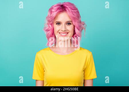 Photo of millennial sweet pink hairdo lady wear yellow t-shirt isolated on teal color background Stock Photo