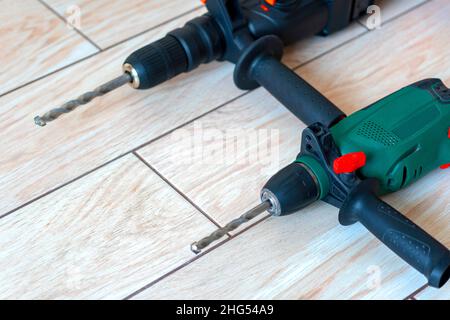 rotary hammer and a drill. percussion and drilling tools Stock Photo