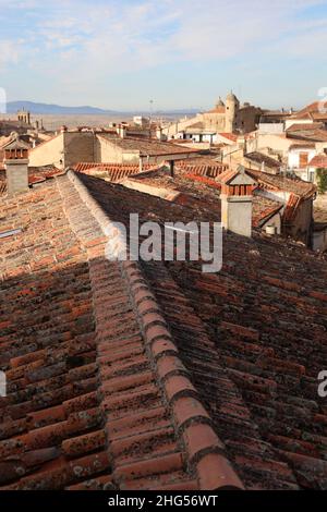 Trujillo. Roof tops of the old quarter of the Renaissance/ medieval town. Province of Caceres, Extremadura, Spain. Fired red Pan tile roofs.Full frame. Stock Photo