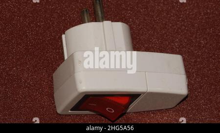 Close up of Plug with electrical connecting switch Stock Photo