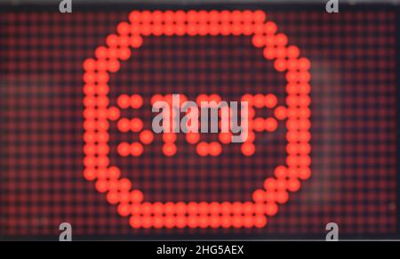 Blur of Red LED digital font or characters on black background, Digital text design Stock Photo