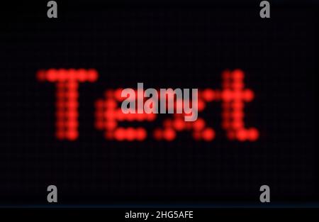 Blur Red LED digital font or characters on black background, Digital text design Stock Photo