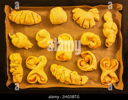 Raw unbaked buns. Cooking process. Traditional pastry Stock Photo