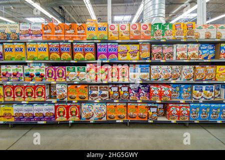Victorville, CA, USA – December  28, 2021:  Large variety of breakfast cereal in a grocery store aisle in Victorville, California. Stock Photo