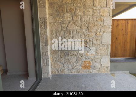 Beautiful view of outdoor clothes dryer on patio of hotel room. Greece. Stock Photo