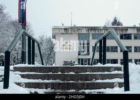 Circa 2020, Pravets, Bulgaria: The town hall of Pravets city. The ground is covered in winter white snow. Stairs in front. High quality photo Stock Photo