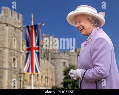 QUEEN ELIZABETH II Windsor Castle exterior happy smiling HRH Queen Elizabeth II in grounds of Windsor Castle meeting invited members of the public Union Jack flag behind UK  (also A6Y491) Stock Photo