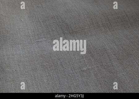 Natural linen texture as a background, natural color. Stock Photo