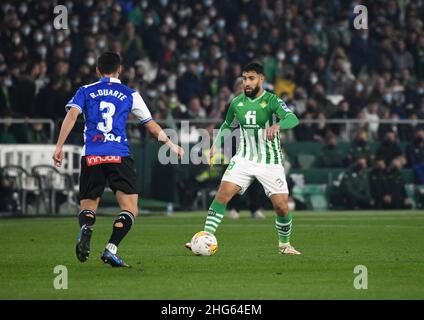 SEVILLE, SPAIN - JANUARY 18: Nabil Fekir #8 of Real Betis drives the ball during the La Liga match between Real Betis and Alavés at Benito Villamarín Stadium on January 18, 2022 in Seville, Spain. (Photo by Sara Aribó/PxImages) Stock Photo