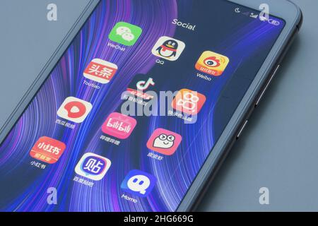 Assorted Chinese social media apps are seen on a Xiaomi smartphone - WeChat, QQ, Weibo, Toutiao, Douyin, Kuaishou, Xigua Video, Bilibili, PipiXia, Red... Stock Photo