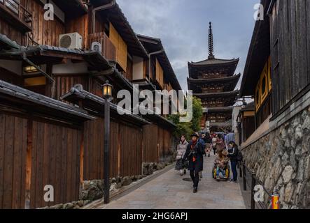 A picture of the narrow street near the Hokan-ji Temple, also known was Yasaka-no-Tou, and people walking on it. Stock Photo