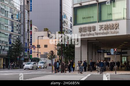 A picture of an intersection in Osaka, next to the Keihan Railway Temmabashi Station. Stock Photo
