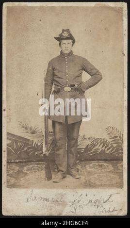 Sergeant Samuel Cole Wright of Co. E, 29th Massachusetts Infantry Regiment, standing in uniform with revolver and musket in front of painted backdrop) - Union Photographic Gallery, ''Camp Stock Photo