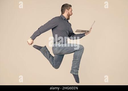 run to success. programmer man use pc. entrepreneur running and hurrying. agile business. Stock Photo