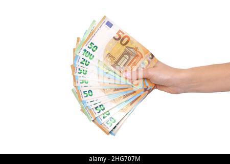 Hand holding euro banknotes isolated on white background with clipping ...