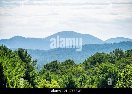View along road in Afton, Nelson County in Virginia near the Blue Ridge parkway with appalachian mountains in summer, scenic lush foliage landscape an Stock Photo